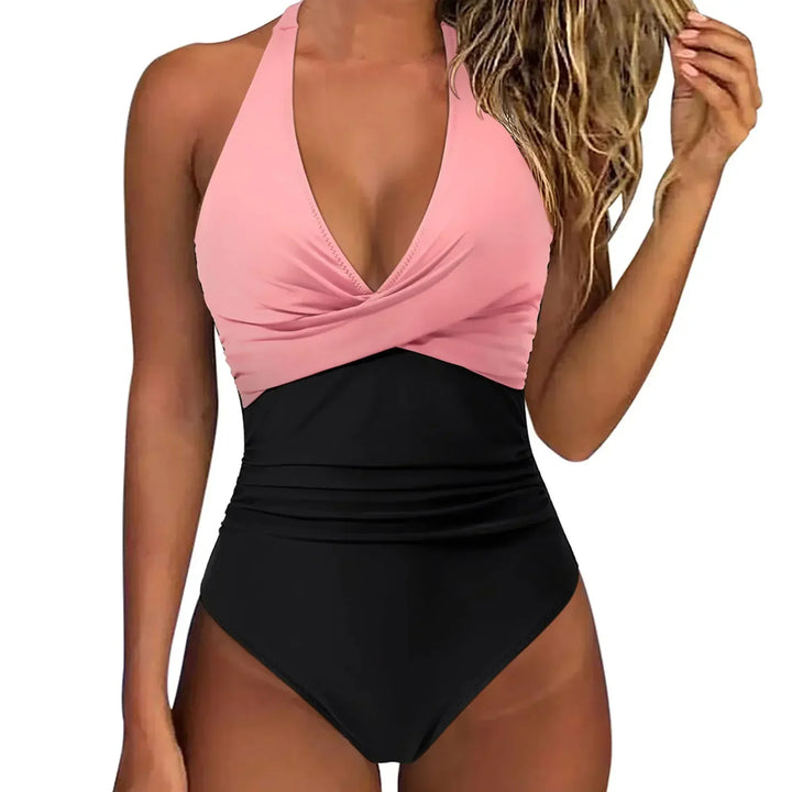 Women's Nyla one piece swimwear, a flattering wrap front design with sculpting elements for a chic summer look.