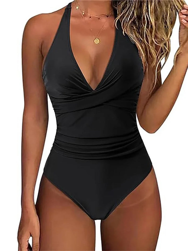 Confidence-boosting women's sculpting one piece swimsuit, perfect for beach, poolside, and summer vacation fashion.