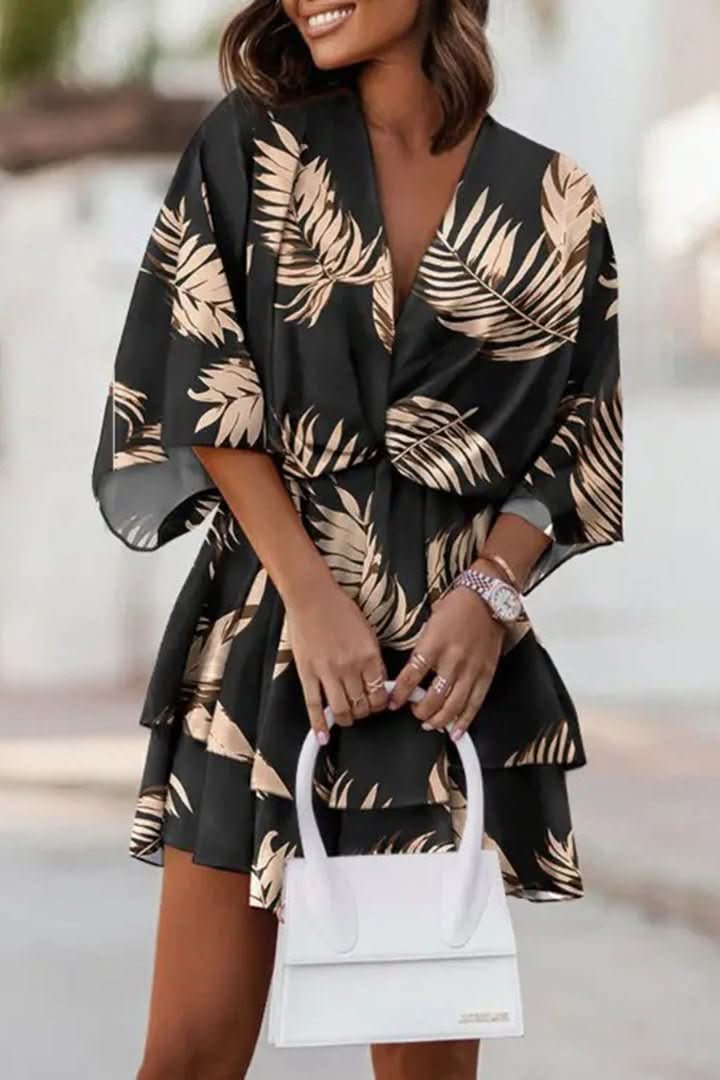Flowy boho off-shoulder mini dress for women, ideal summer casual wear, festival outfit, & comfortable style.