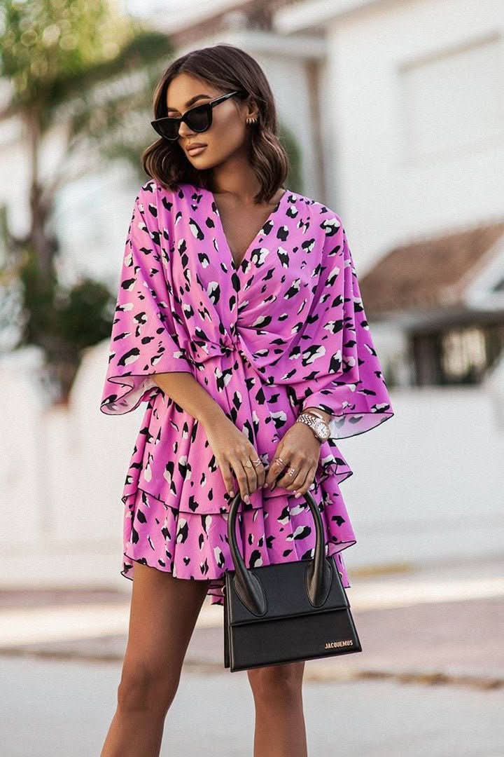 Front view of a women's off-shoulder bohemian mini dress, short, comfortable & stylish for summer.