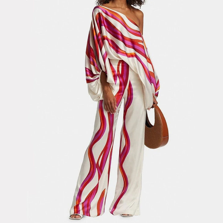 Elegant women's off-shoulder printed two-piece set, ideal for summer fashion & casual wear.