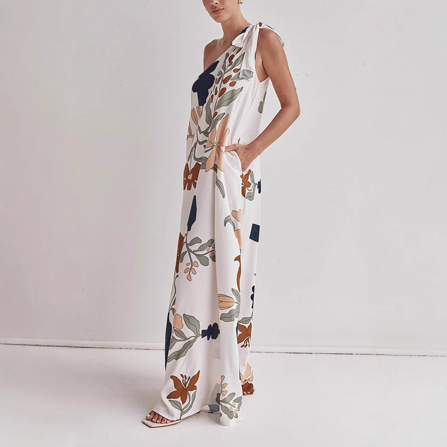Apricot floral print one-shoulder maxi dress for women. Stylish and comfortable long summer gown, ideal for casual wear.