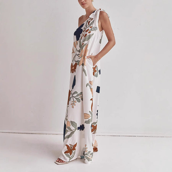 Apricot floral print one-shoulder maxi dress for women. Stylish and comfortable long summer gown, ideal for casual wear.