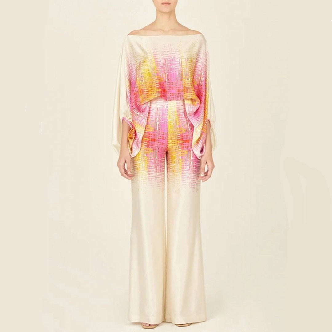 Stylish women's one-shoulder top and wide-leg printed pants. This fashionable two-piece co-ord set is vacation ready.