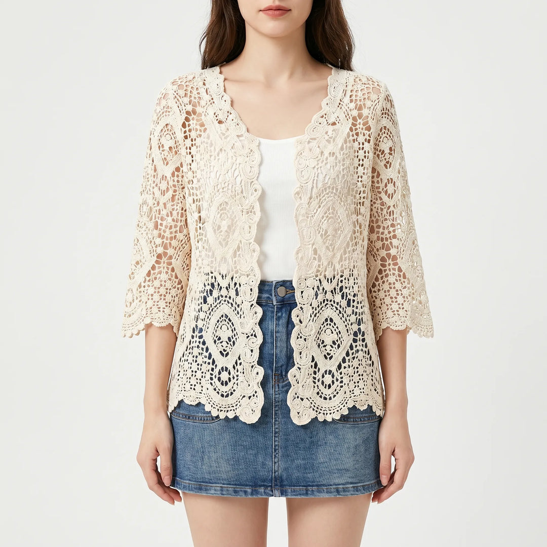 Lightweight women's apricot crochet style cardigan with floral knit, ideal for summer layering and bohemian fashion.