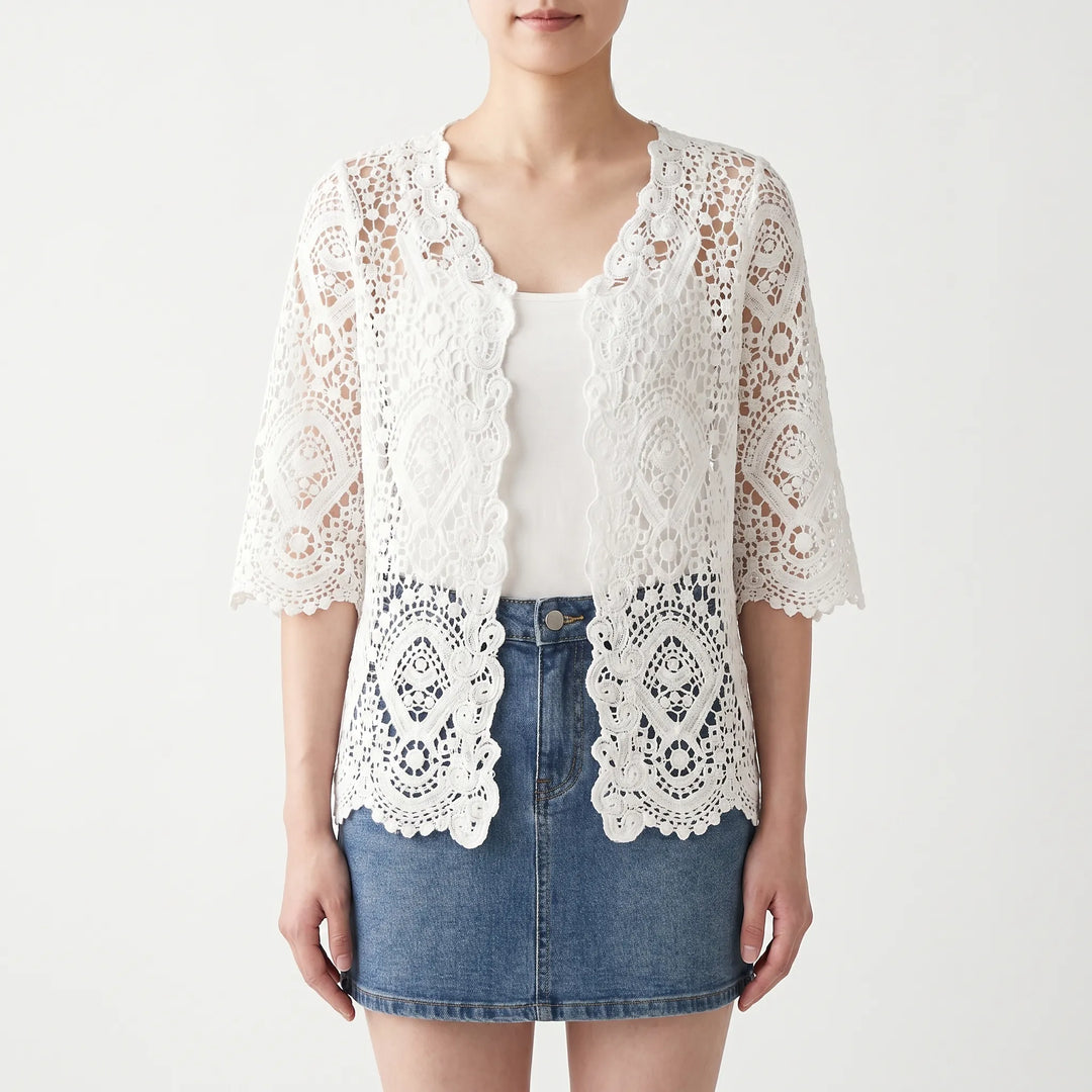 Textured apricot crochet style open-front cardigan for women, featuring a delicate floral knit for summer.