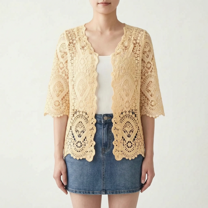 Bohemian women's white open-front crochet style cardigan, lightweight and perfect for summer layering.