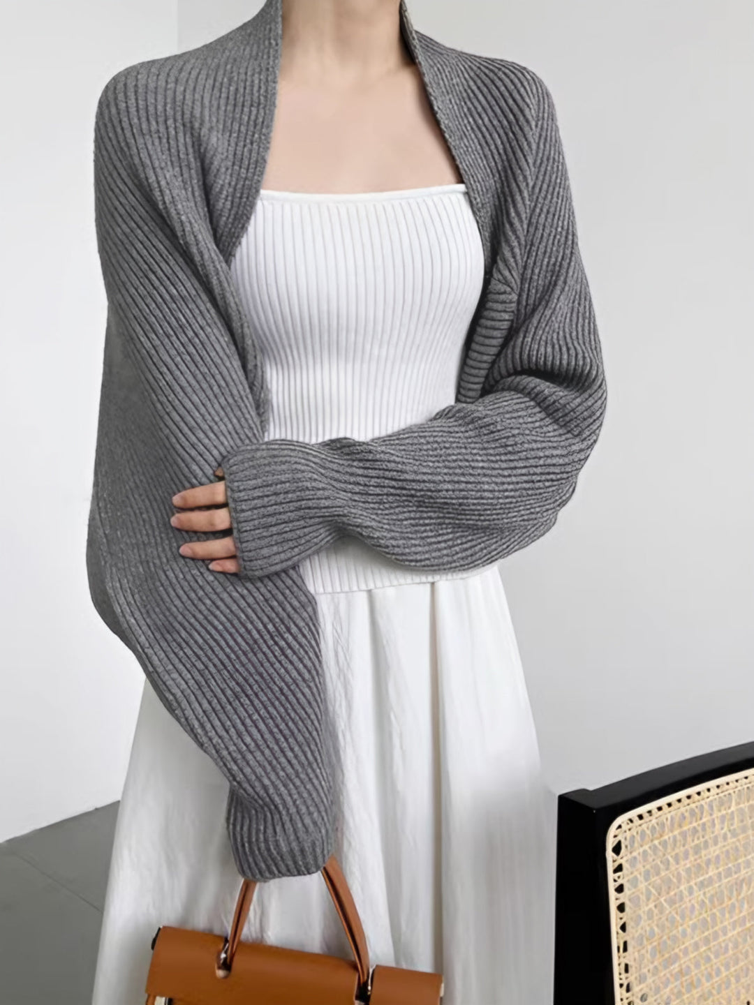 Fashionable women's regular fit open-front long sleeve shrug sweater, great for casual chic layering.