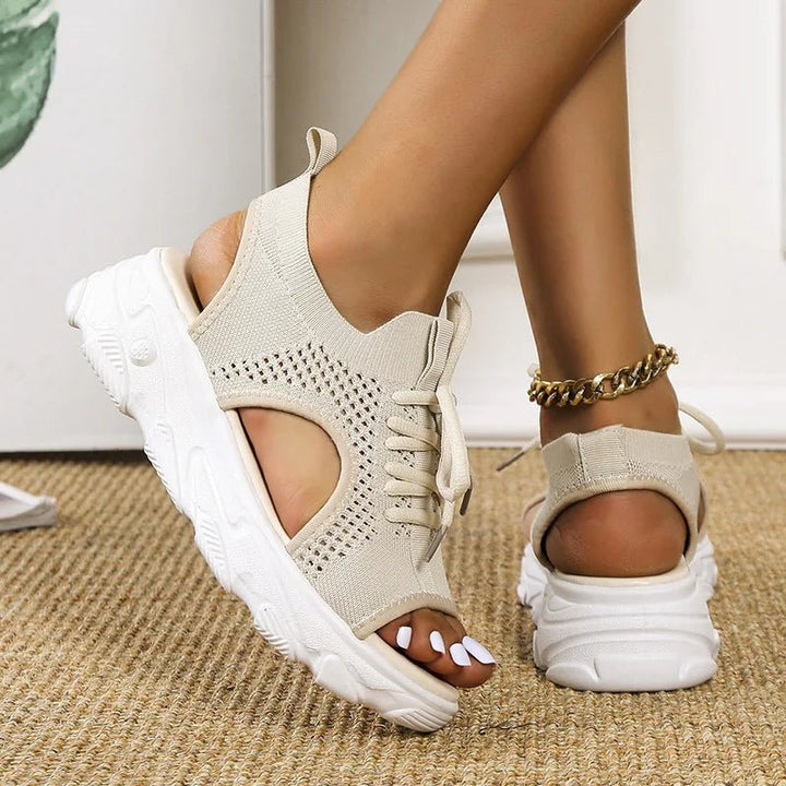 Trendy women's open-toe platform sandals, lace-up design, perfect for casual summer footwear.