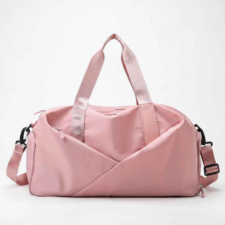 Durable nylon women's organized gym duffel bag, ideal for fitness, workout, and active travel.
