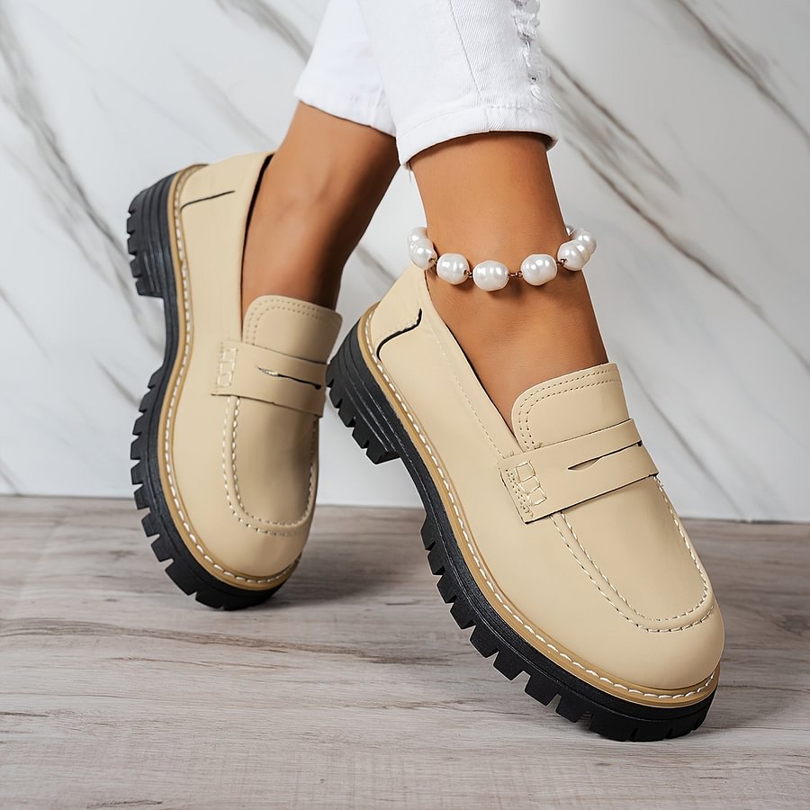 Comfortable flat orthopaedic loafers for women, wide toe box design for enhanced support.