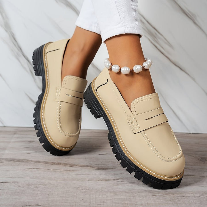 Comfortable flat orthopaedic loafers for women, wide toe box design for enhanced support.