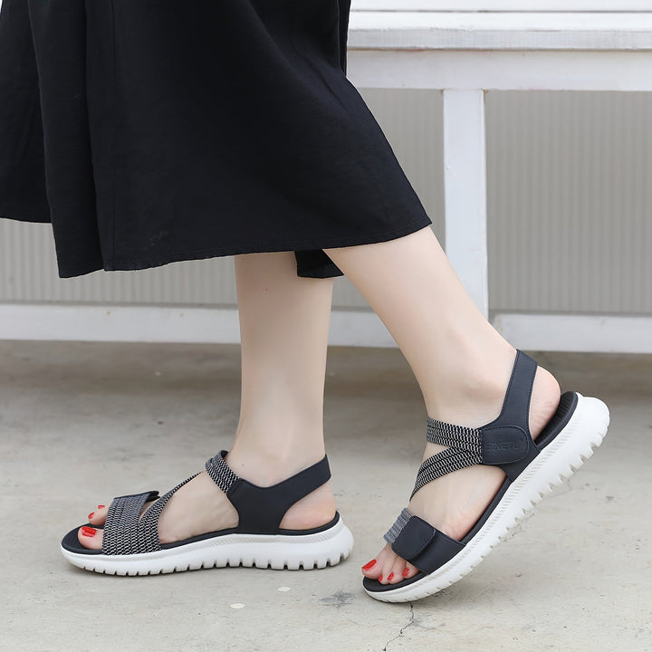 Supportive black sandals for women, orthopedic design for foot pain and comfortable walking.