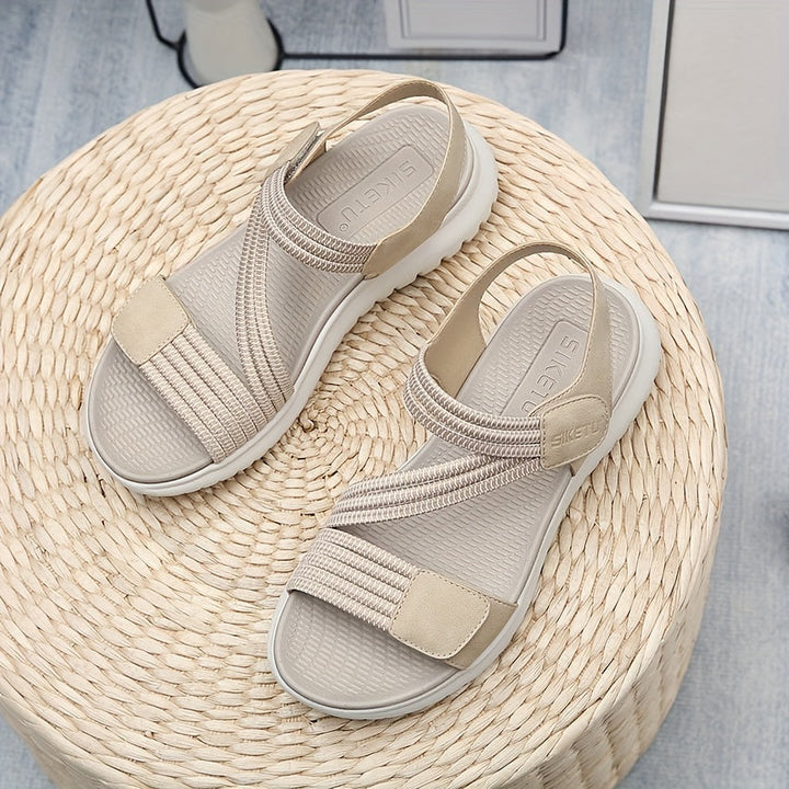 Supportive blue orthopedic sandals for women, designed for plantar fasciitis relief & comfort.