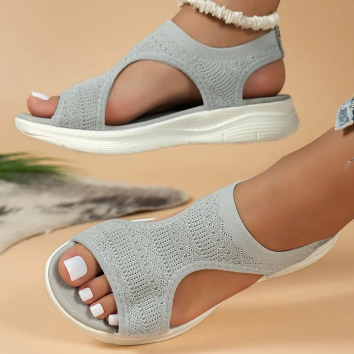 Comfortable women's orthopedic sandals offering arch support, cushioning, and non-slip grip for everyday pain relief.