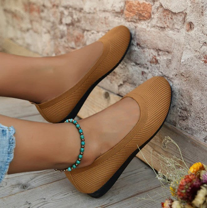 Supportive women's casual ballet flats, featuring orthopedic arch support and breathable comfort for daily activities.