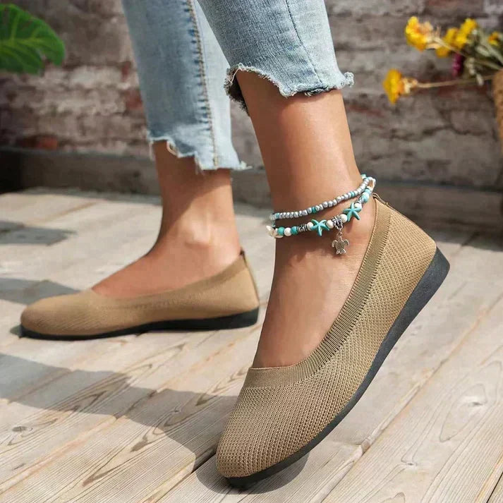 Stylish women's ballet flats with orthopedic arch support. Breathable, comfortable slip-ons for casual outfits.