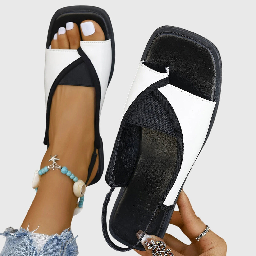 Orthopedic women's sandals designed for beach comfort, offering foot support and cushioning. Open-toe summer shoes.
