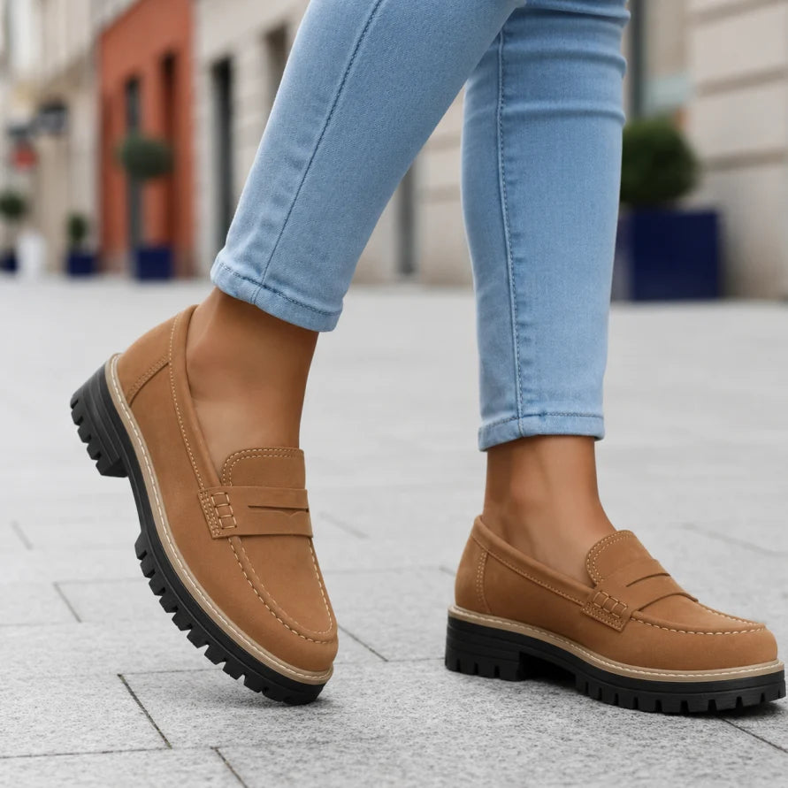 Close-up: Women's orthopedic chunky sole loafers. Detail of modern platform design, quality material & comfort.