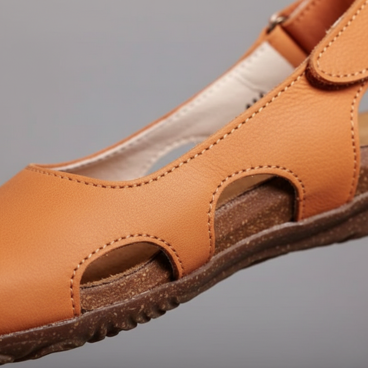 Comfortable women's orthopedic sandals with supportive closed toe & adjustable slingback strap.