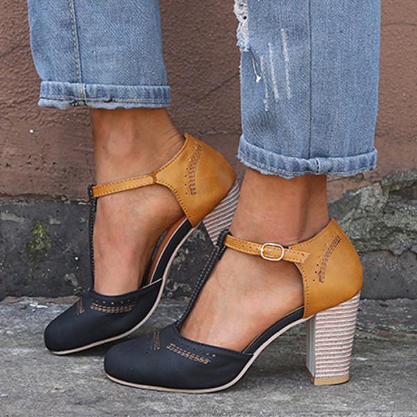 Underside of women's comfort heeled shoes, showing non-slip sole and stable block heel for orthopedic support.