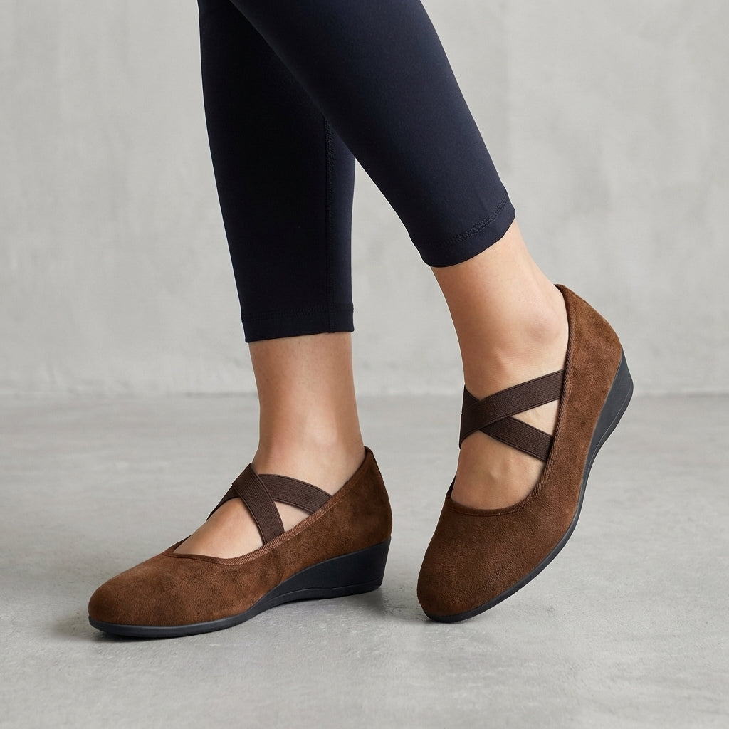 Elegant women's criss-cross wedge sandals, versatile for summer footwear & stylish comfort.