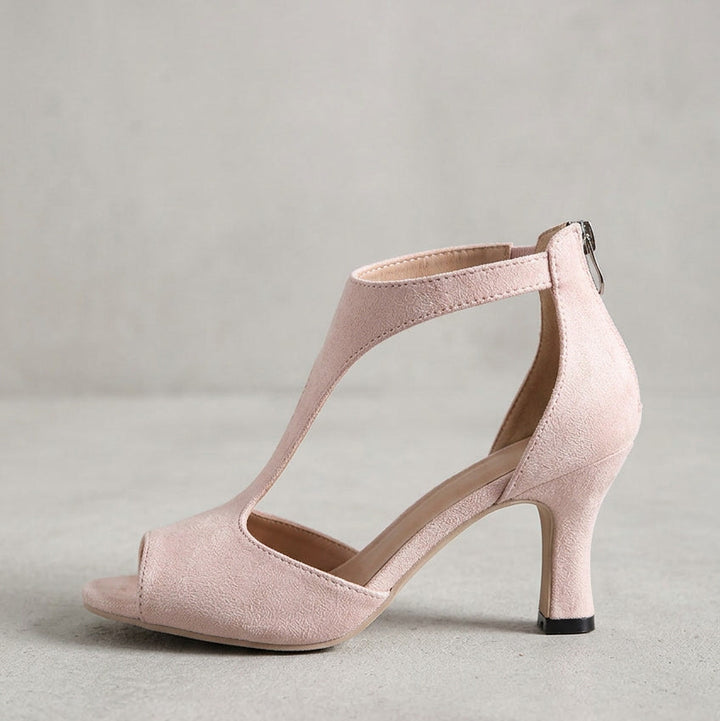 Black orthopedic high heels for women, cushioned and designed for comfortable foot support.
