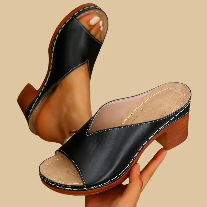 Versatile women's flat sandals offering orthopedic comfort and support for daily wear.