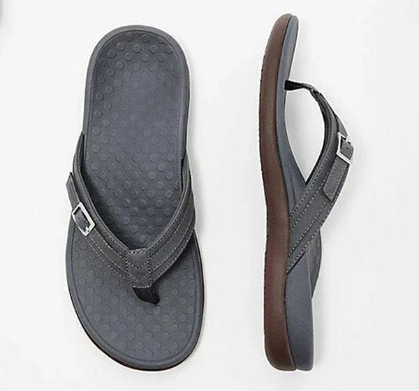 Stylish women's orthopedic flip-flops, featuring ergonomic arch support & cushioned footbed for all-day comfort.