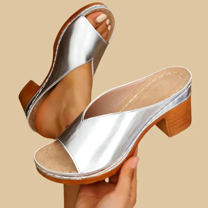 Stylish women's orthopedic sandals with a comfortable block heel for versatile day-to-night wear.
