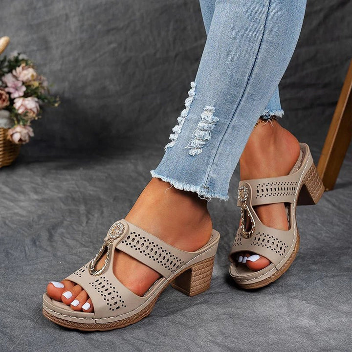 Elegant women's heeled sandals with breathable openwork design, perfect for summer casual wear.