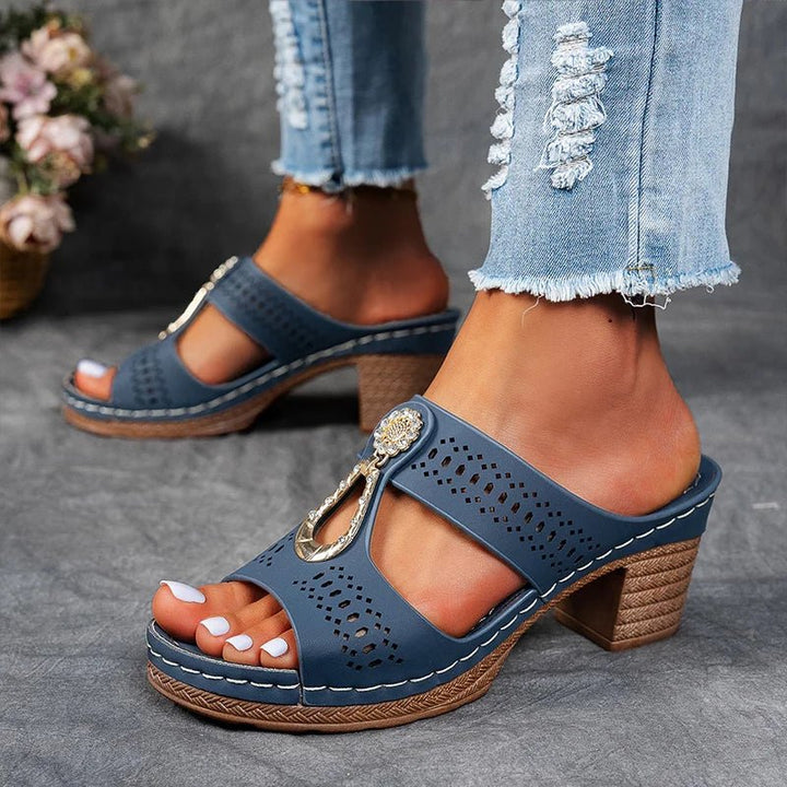 Comfortable women's orthopedic slip-on heeled sandals with arch support for elegant daily wear.