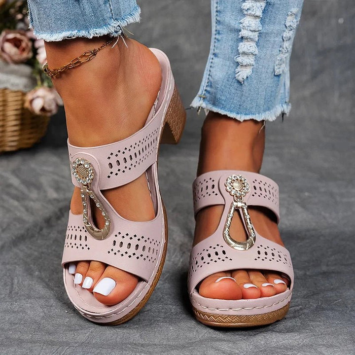 Breathable women's orthopedic heeled sandals, featuring openwork design & arch support for summer comfort.