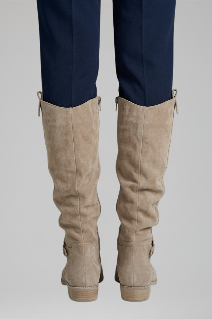 Durable women's orthopedic knee-high boots with side zip, great for comfortable everyday wear.