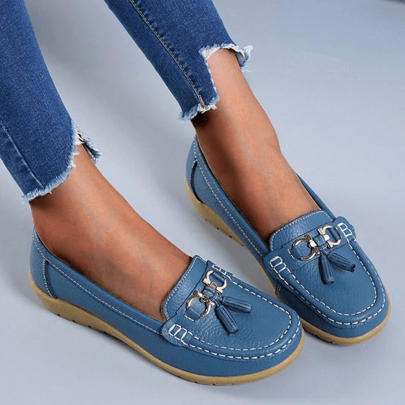 Top view of stylish women's slip-on orthopedic flats, designed for all-day comfort & support.
