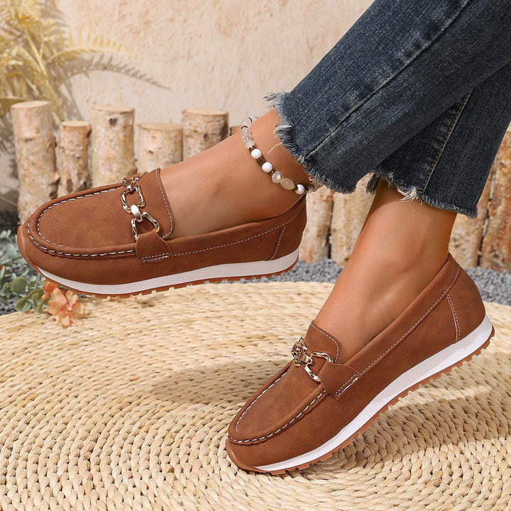 Women's slip-on loafers with wide toe box, arch support, and orthopedic design for comfort.