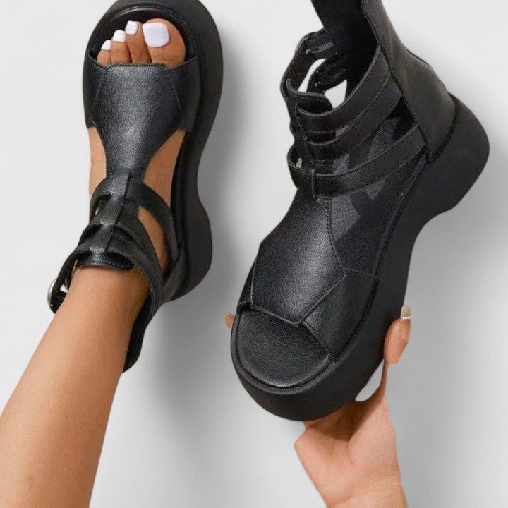 Chic women's platform sandals with multi-straps. Orthopedic support ensures comfortable, posture-friendly summer footwear.