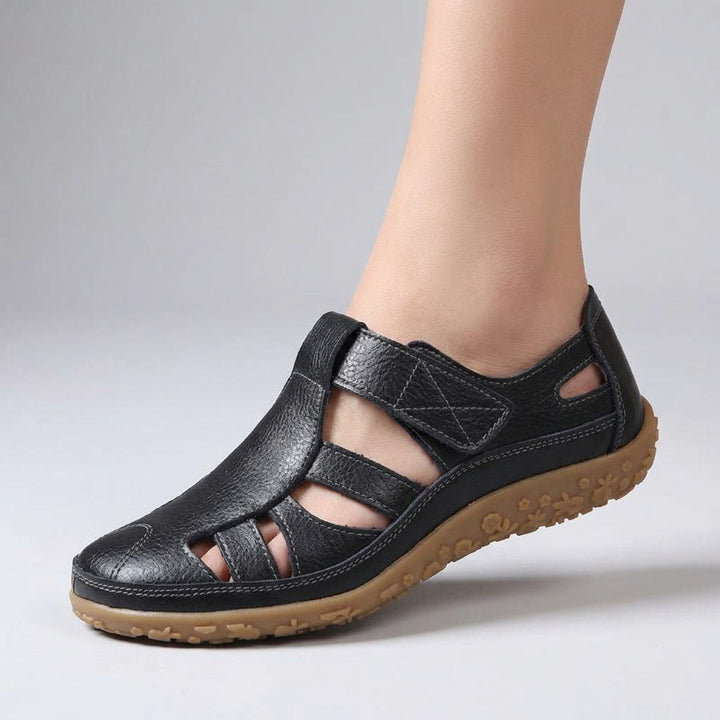 Orthopedic slip-on sandals for women, non-slip sole, strong arch support for active lifestyles.