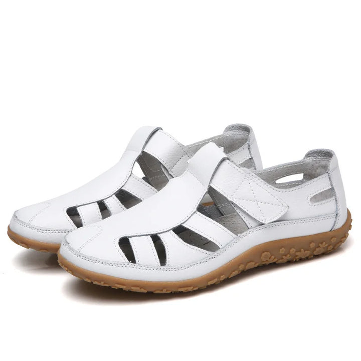 Slip-on women's summer sandals with orthopedic arch support and a durable non-slip outsole.
