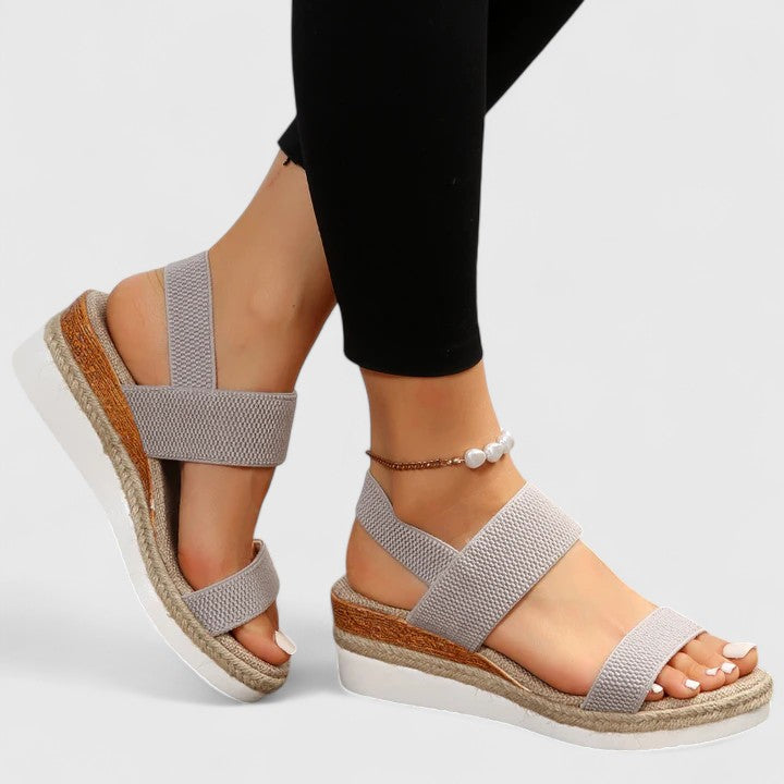 Ergonomic women's open-toe wedge sandals with advanced arch support for all-day orthopedic comfort.