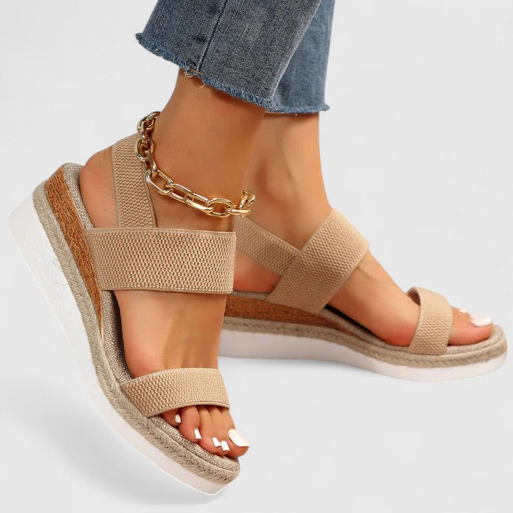 Supportive women's open-toe wedge sandals offering arch support and comfort for plantar fasciitis.