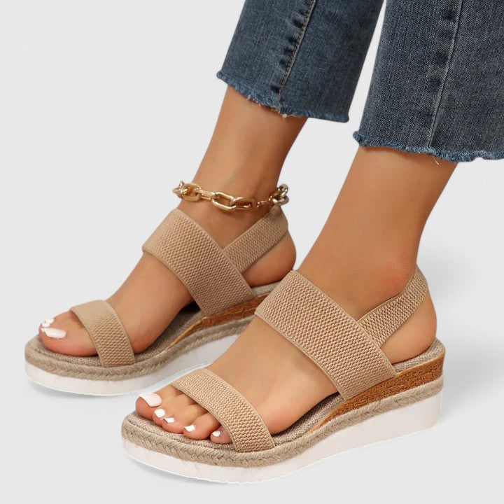 Women's orthopedic sandals, open-toe wedge style, providing plantar fasciitis relief & arch support.
