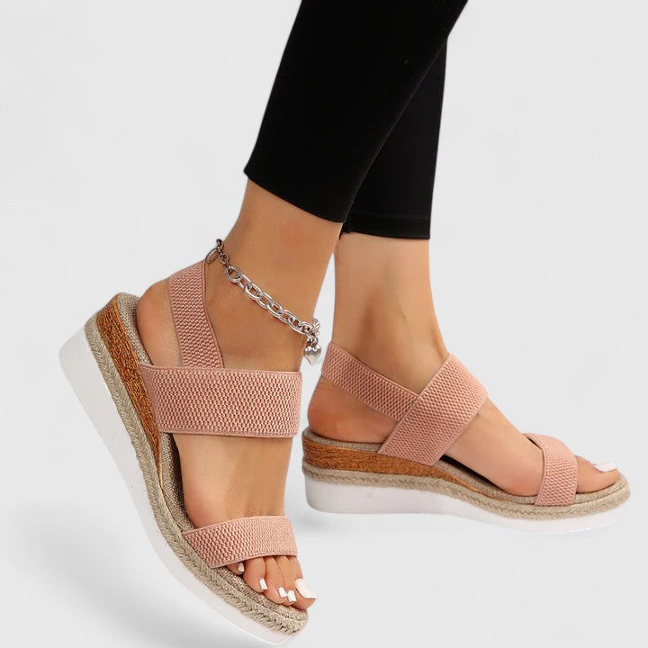 Textured women's orthopedic open-toe wedge sandals for casual comfort and arch support.