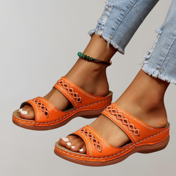 Supportive women's platform sandals featuring arch support for elevated comfort. Great for walking.