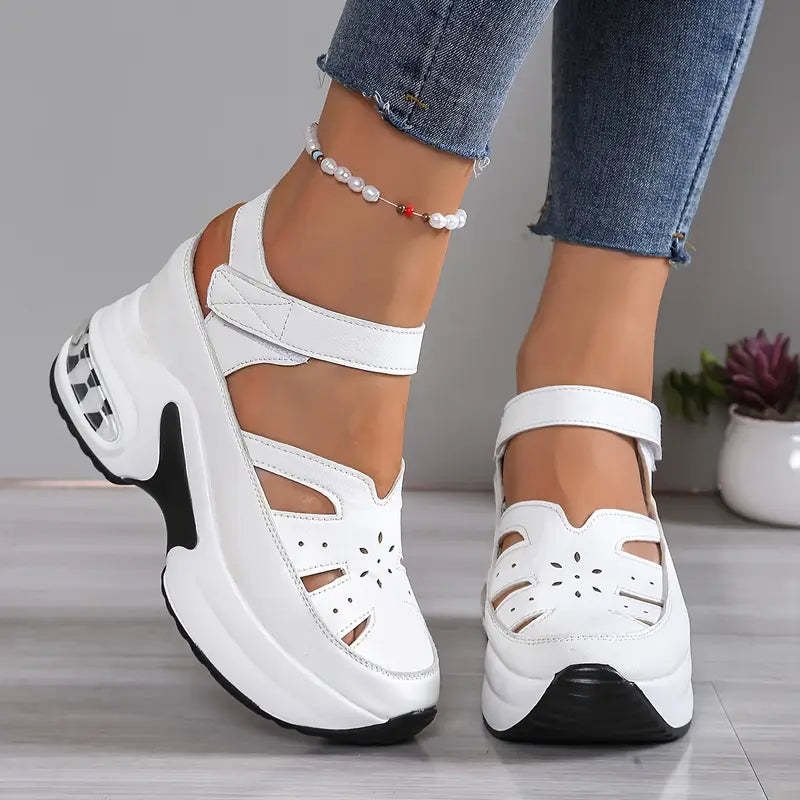 Stylish women's platform wedge sandals with open toe. Casual summer footwear offering orthopedic comfort.