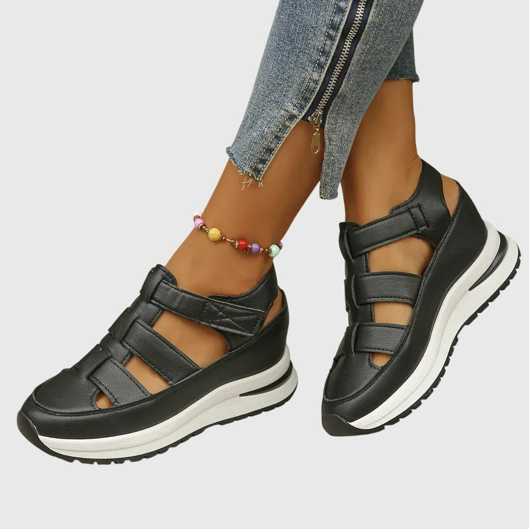 Women's orthopedic sandals with adjustable arch support, comfortable for summer walking & foot comfort.