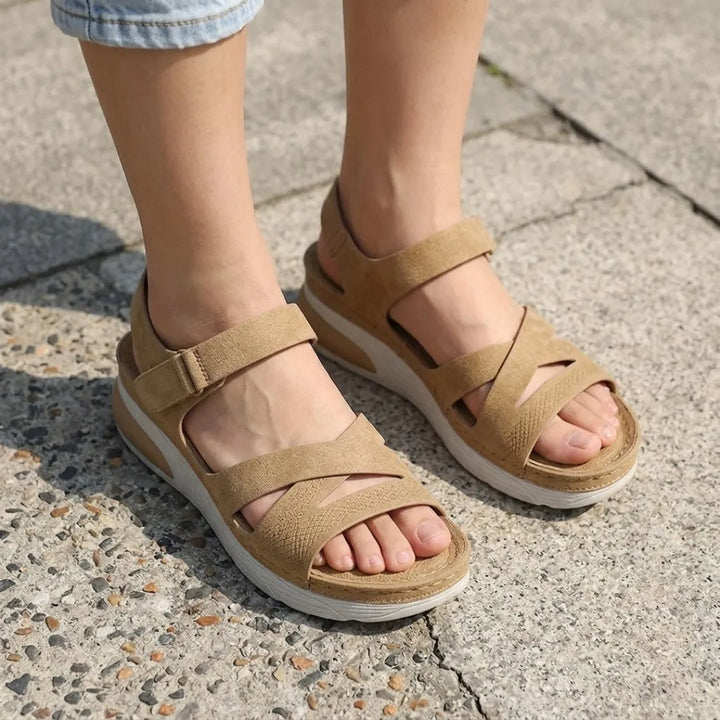 Versatile women's walking sandals with adjustable straps & orthopedic arch support for everyday comfort.