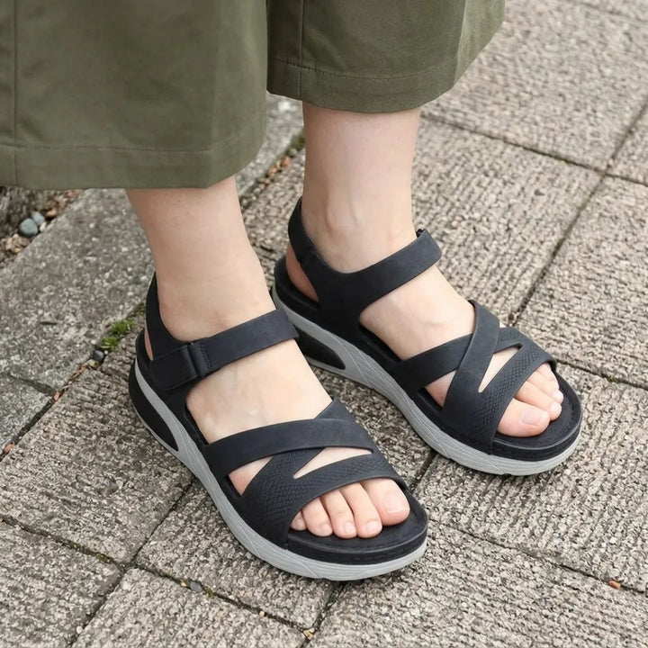 Comfortable women's orthopedic sandals for foot pain relief, featuring arch support & adjustable straps.