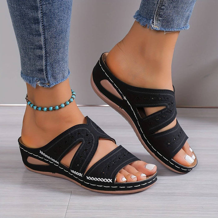 Comfortable women's slip-resistant sandals for foot pain relief. Ergonomic arch support for walking.