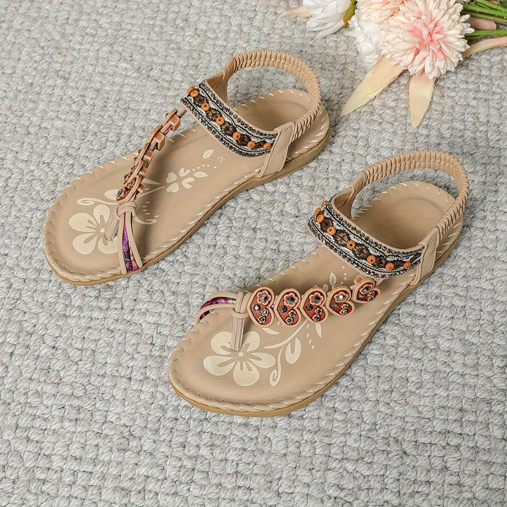 Open-toe women's comfort sandals, ideal for warm weather and walking, with arch support.